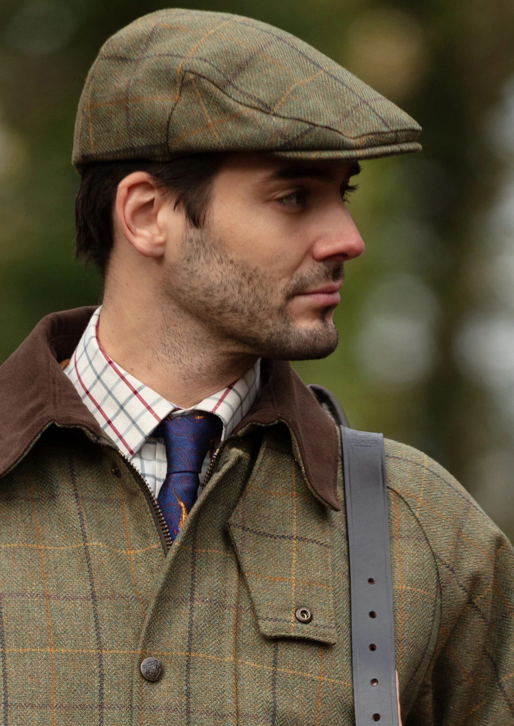 Rutland Men's Tweed Flat Cap In Dark Moss 2 Rutland Men's Tweed Flat Cap In Dark Moss - Image 2